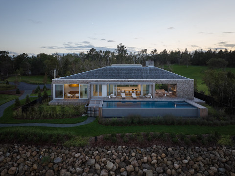 Drone shot of pool and house